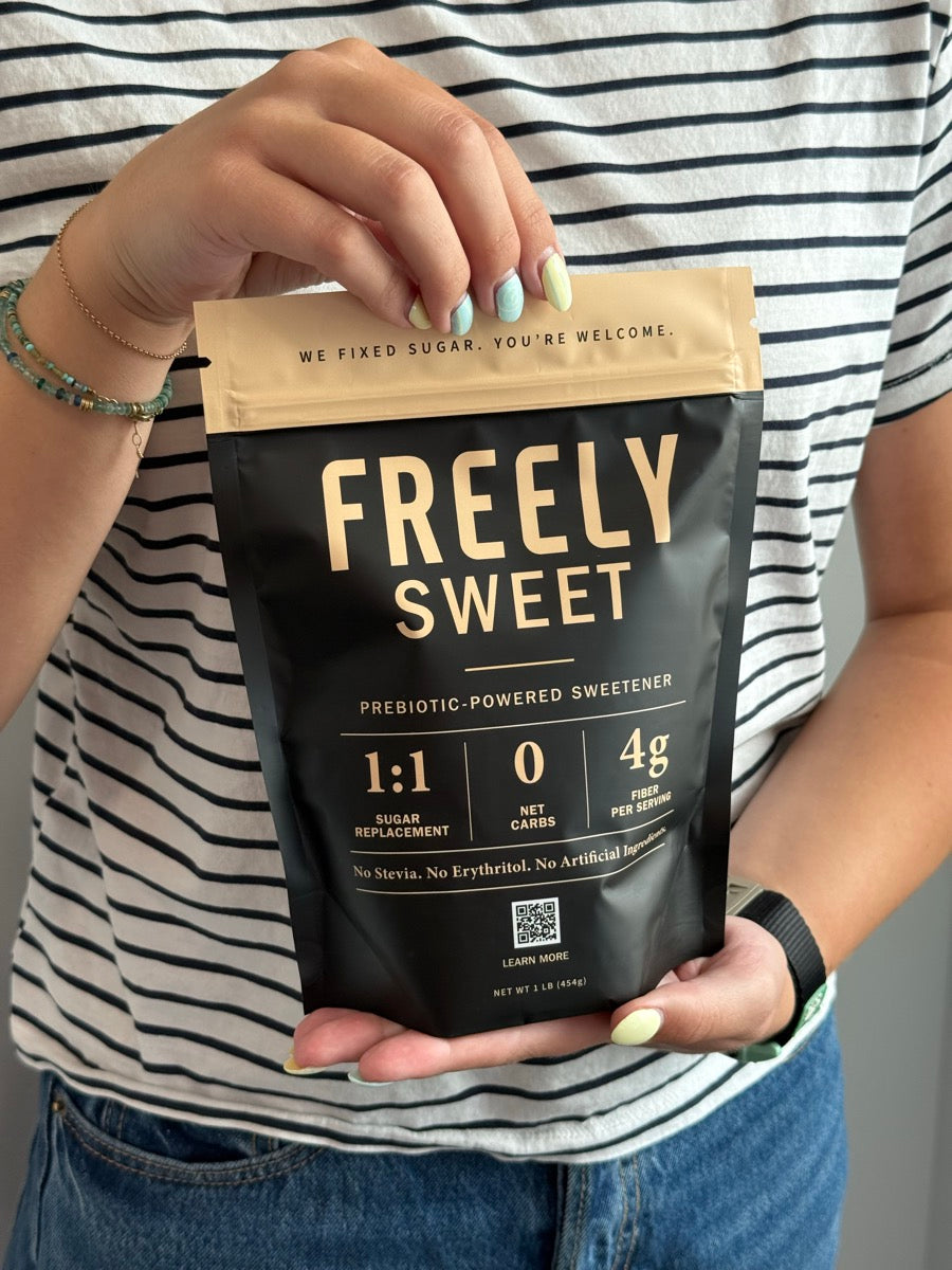 Holding a Freely Sweet pouch