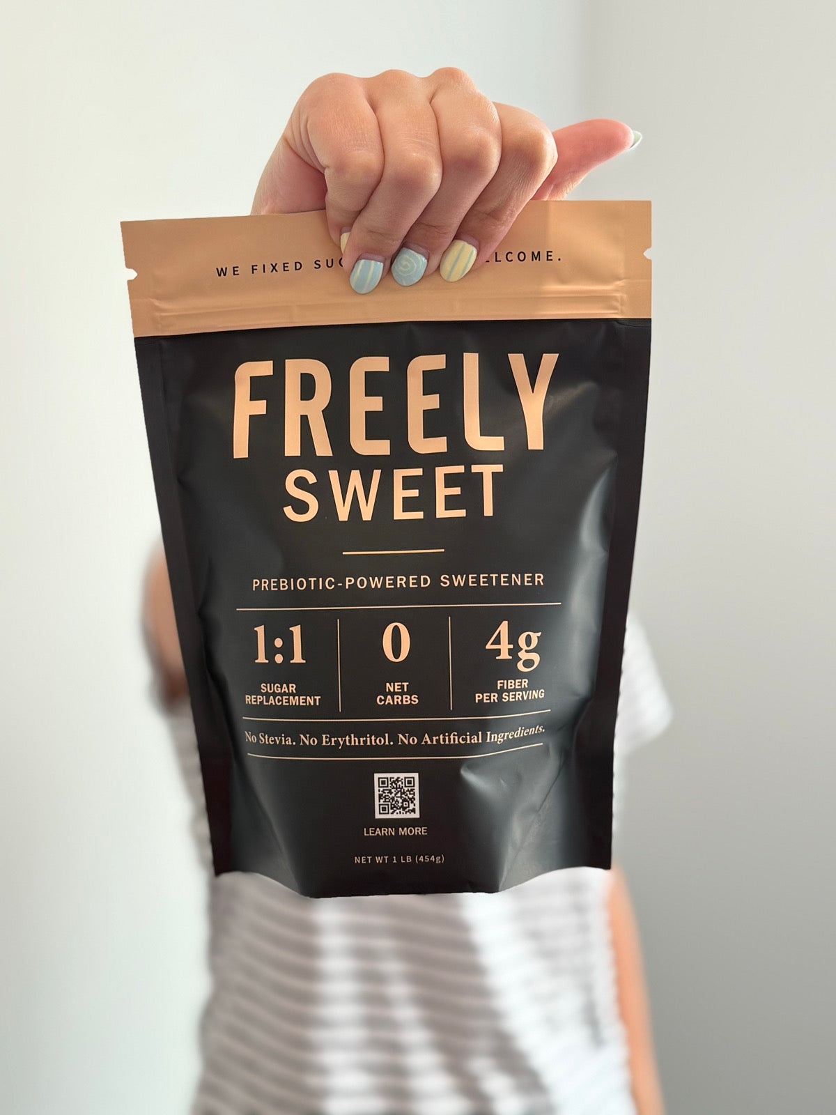 Freely Sweet pouch held by the top grip